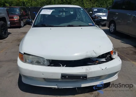 1999 Mitsubishi Mirage De from USA, damaged, VIN JA3AY26A5XU027527